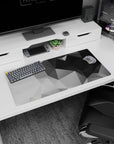 Modern 32x16 inches mouse pad featuring geometric grayscale design, blending sharp angles and black, gray, and white shades for a sleek workspace.