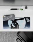 28x12 inches mouse pad with Guts in his Berserker Armor, silhouetted under a glowing full moon, ideal for creating a dynamic and serene atmosphere at your desk.