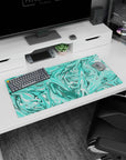 Modern 32x16 inches mouse pad showcasing vibrant turquoise aqua swirls, bringing peaceful energy and dynamic motion to your workspace.