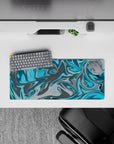 28x12 inches mouse pad with a blue and gray swirl design, featuring aqua blues and sleek grays for a calm, productive atmosphere.