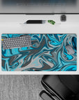 32x16 inches mouse pad with a flowing blue and gray swirl design, blending aqua blues and steely grays for a relaxing, creative vibe.