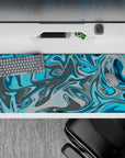 36x16 inches mouse pad with a flowing blue and gray swirl design, blending aqua blues and steely grays to enhance creativity and calm.