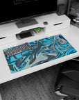 Modern 32x16 inches mouse pad featuring a blue and gray swirl design, with aqua blues and steely grays for a calm, productive workspace.