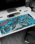 Large 40x20 inches mouse pad with a blue and gray swirl design, featuring aqua blues and sleek grays for a calming, stylish look.