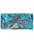Mouse pad featuring a blue and gray swirl design, 32x16 inches, with aqua blues and steely grays creating a calming, stylish atmosphere.