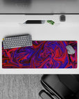 Vibrant 32x12 mouse pad featuring purple and red swirls for an energetic, abstract design to bring color and movement to your setup