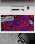 Vivid 32x16 mouse pad with swirling purple and red pattern for an energetic, colorful vibe that inspires creativity and movement