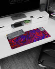 Vivid 28x12 mouse pad with abstract purple and red swirls, ideal for a workspace that inspires energy, focus, and creativity