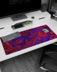 Abstract 36x16 anime desk mat with vivid purple and red swirls, perfect for sparking creativity and adding a colorful touch to your desk