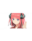 36x16 inches anime girl desk pad with Nino-style smug stare, clean white background and sleek accents.