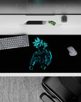 36x16 inches desk pad showcasing Goku with glowing blue accents, perfect for adding strength and energy to your desk in a minimalist design.