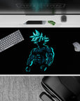 40x20 inches desk pad showcasing Goku in a dark silhouette with glowing blue highlights, ideal for fans of Dragon Ball seeking a bold, dynamic design.