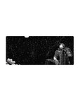 Mouse pad featuring Guts under a brilliant starlit sky, 28x12 inches, perfect for capturing the calm before the storm and adding peaceful strength to your workspace.