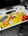 Large 40x20 inches desk pad featuring Luffy from One Piece, engulfed in flames, exuding his fierce energy and unstoppable strength during a powerful attack.