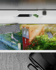 Cozy anime desk pad 36x16 inches in gentle greens and dusty blues, calm nostalgic summer mood.