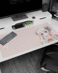 40x20 inches desk pad featuring a shy chibi anime girl in kimono, soft pink backdrop, and handwritten Tsuki 月.