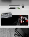 Intense 32x12 desk pad features Kaneki’s ghoul mask and menacing gaze with intricate details for fans of dark artistry