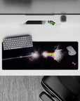 Moody rainbow sci-fi desk pad mouse pad 32x12 inches in deep black with smoky prism light bands.