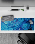 Refreshing 32x12 mouse pad with swirling oceanic blues and bubble-like details for a serene and dynamic coastal look