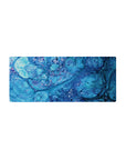 Oceanic blues 28x12 mouse pad with dynamic swirling patterns and bubble-like details for a serene coastal experience
