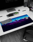Artistic 36x16 inches mouse pad featuring a firewatch scene with a moonlit watchtower and mountains for an adventurous workspace.