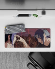 Itachi and Sasuke's iconic final moment from Naruto on a 28x12 inch mouse pad, capturing the emotional depth vividly.