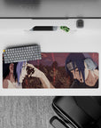 Anime mouse pad 32x12 inches featuring Itachi's iconic last moment with Sasuke from Naruto, capturing deep emotion.
