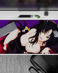 Anime desk pad 40x20 inches with a mischief-eyed character, silky black hair, and feline ears on a royal purple backdrop.