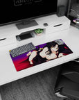 Anime mouse pad 28x12 inches featuring a mischievous neko girl with golden eyes and black hair on a royal purple background.
