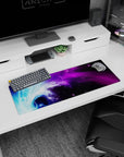 Small but impactful 32x12 desk mat showcases galactic beauty with striking purple and blue artistry