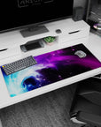 Galactic artwork on 36x16 desk mat captures the essence of cosmic energy with vivid colors and fluid motion