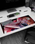 Artistic 36x16 inches desk pad with a cursed bloom, creating a beautiful contrast of roses and blood, perfect for a dark-themed workspace.