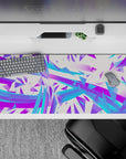 36x16 inches desk pad with electric abstract design, combining neon purple, electric blue swirls, and sharp geometric shapes for a tech-inspired look.