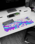 Artistic 32x12 inches mouse pad featuring electric abstract design, with neon purple and electric blue swirls and sharp geometric shapes for creativity.