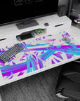 Large 40x20 inches desk pad featuring electric abstract design, blending neon purple, electric blue swirls, and sharp geometric shapes for bold creativity.