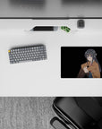 Cozy dramatic anime mouse pad 14x10 inches in soft browns, inky black hair, and cool blue eyes.
