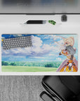Darkness from Konosuba winks under a dreamy sky on a 32x16 inch anime mouse pad, blending clouds and armor detail.