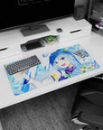 Anime mouse pad 32x16 inches featuring Aqua from Konosuba with icy tones, pastel fans, and her cheeky grin.