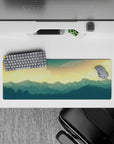 Golden sky 32x12 mouse pad with deep blue mountains, offering a peaceful and inspiring design for work or gaming environments