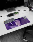 Anime mouse pad featuring Sasuke Uchiha from Naruto, with Mangekyō Sharingan, 28x12 inches, vibrant purple hues.