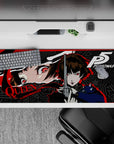 Makoto Niijima Persona 5 desk mat, 36x16 inches, features Queen aiming fiercely with red, black, and grey chaotic design.