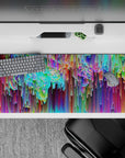Striking 36x16 desk pad highlights bold vertical strokes in vivid hues with intricate kaleidoscope-like details in stunning artistry