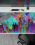 Dynamic 40x20 desk pad showcases a stunning array of hues with motion-filled brushstroke patterns for an energetic workspace vibe