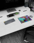 Iconic 14x10 desk mat celebrates Kaleidoscope Chaos with vivid vertical strokes, bold hues, and creative motion