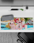Anime girl mouse pad 32x12 inches in ocean blues with glossy reds, golden hair, and jewel-bright details.