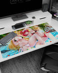 Anime girl desk pad 40x20 inches showing two sun-kissed girls lounging by bright waves under palm fronds.