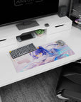 28x12 inches mouse pad showing bright-eyed blue-haired anime girl lounging with a card in hand, star motifs.