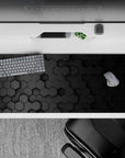 36x16 inches desk pad with hexagonal pattern design, showcasing 3D honeycomb in muted black tones for a sophisticated, minimalist vibe.