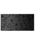 Mouse pad featuring hexagonal pattern design, 32x16 inches, with a 3D honeycomb in muted black tones for a minimalist, stylish workspace.