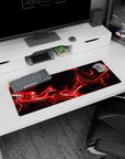 Artistic 32x12 inches mouse pad featuring red and black abstract design, with fiery red streaks and dark background for a captivating, creative effect.